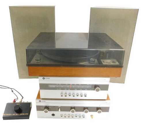 A Leak music centre, comprising a Delta AM/FM tuner, Delta 70 amplifier, record player, and a...