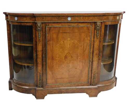 A Victorian figured walnut credenza, with gilt metal mounts, the frieze mounted with blue...