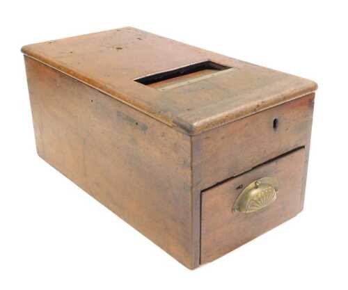 An early 20thC mahogany cased cash till, with a brass cup handle, 24cm wide, 49cm deep.