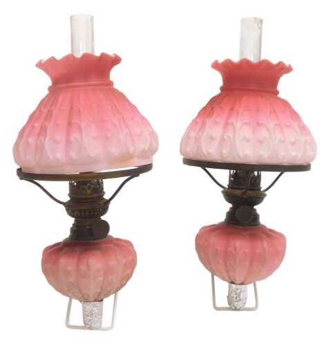 A pair of late 19thC brass and opaline glass oil lamps, bases lacking, with fluted and leaf...