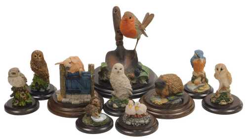 A group of Country Artists figures, including a robin on trowel, hedgehogs, owls, kingfisher,...
