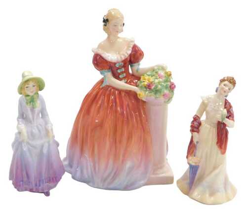 Three Royal Doulton figures, comprising Roseanna HN1926, Marigold HN1447, and Esmeralda HN2169.