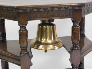 A metal ship's bell, mounted into an oak three tier side cabinet, with fluted frieze and turned... - 2