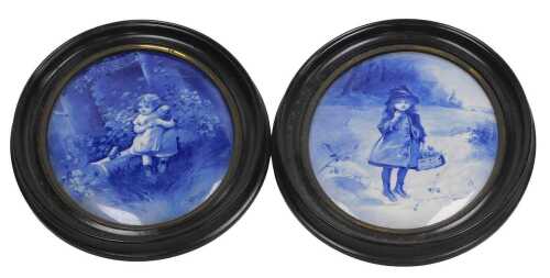 A pair of late 19thC Royal Doulton Blue Children ware oval plaques, by L Bentley, and J Boulman,...