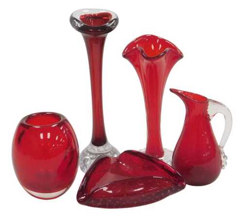 A group of Whitefriars ruby glass, comprising three vases, a triangular shaped dish, and a cream...