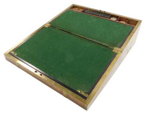 A Victorian burr walnut and brass bound writing box, the hinged lid opening to reveal a green...