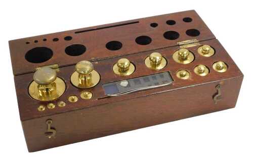 A set of Baird & Tatlock (London) Limited brass weights, &frac14;g-1kg, cased.