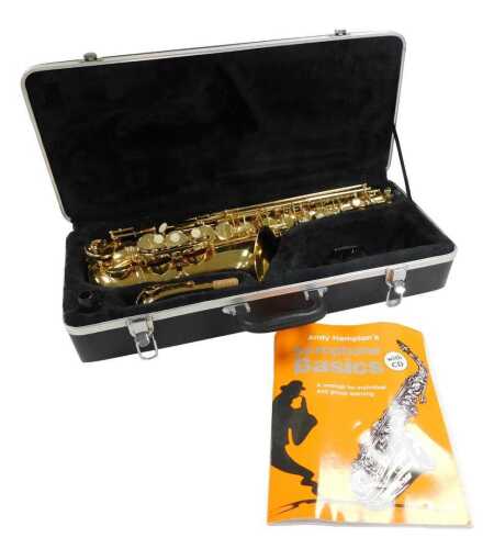 A J Michael brass saxophone, cased, together with Andy Hampton's Saxophone Basics music book.