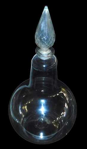 A late 19thC cut glass apothecary's carboy, with a faceted cut glass stopper, 77cm high. (AF)
