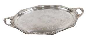 An Edward VII silver oval twin handled tray, with engraved Rococo style decoration of flowers...
