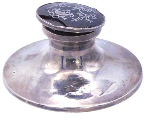 A George V loaded silver tortoise shell and pique decorated capstan inkwell, decorated with...