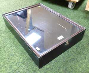 A glass fronted counter top display cabinet, of rectangular form, 55cm high, 38cm wide.