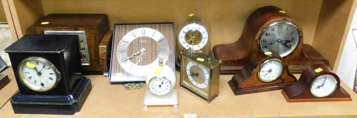 Clocks, to include a trio of Napoleon form clocks from late 1900s onwards, a Kienzle...