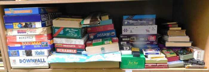 Games, to include Hungry Hippos, Guess Who, Monopoly, Downfall, dominoes, playing cards, some...