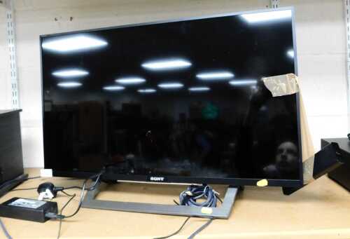A Sony 32" television, model KDL-32WD756, with lead and remote.