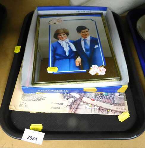 A mirror decorated with figures of Princess of Wales and Prince Charles, together with further...