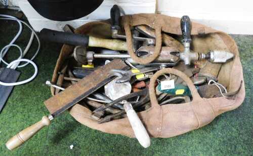 Hand tools, to include hand drill, spanners, etc., contained in a bag.