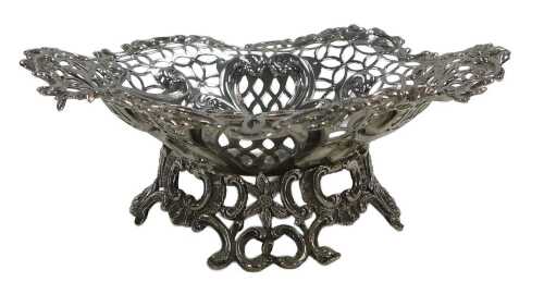 A Victorian silver pedestal sweetmeat dish, with pierced and embossed decoration of flowers,...