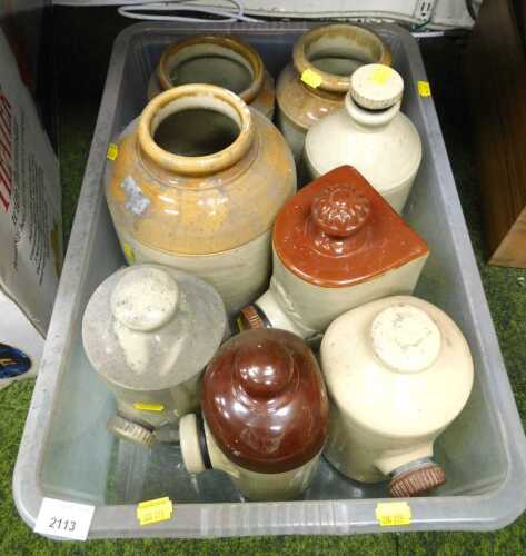 Various stoneware jars and foot warmers. (1 box)