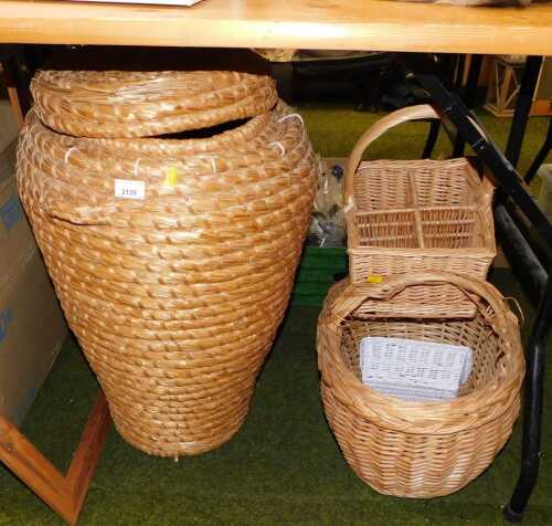 A wicker linen basket, of cylindrical tapering form with cover, a four bottle basket, etc. (a...