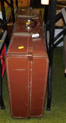 A Paxall suitcase, with another smaller similar suitcase inside, etc. (a quantity)