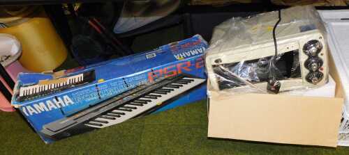 A Yamaha electric keyboard, PSR-2, boxed microwave, bed tray, etc. (contents under 1 table)
