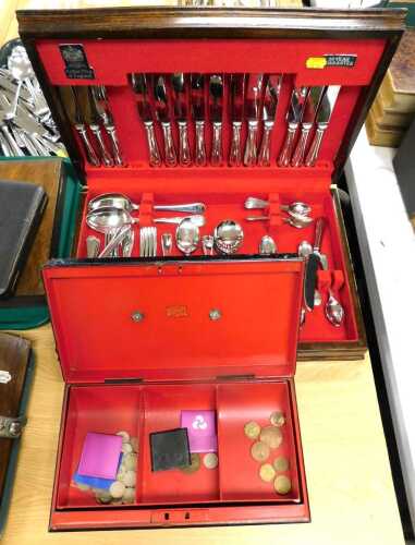 V - An Arthur Price of England canteen, in an oak box, together with a metal money box. (2) Note:...
