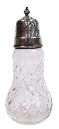 An Elizabeth II cut glass and silver sugar sifter, Birmingham 1990, 17cm high.
