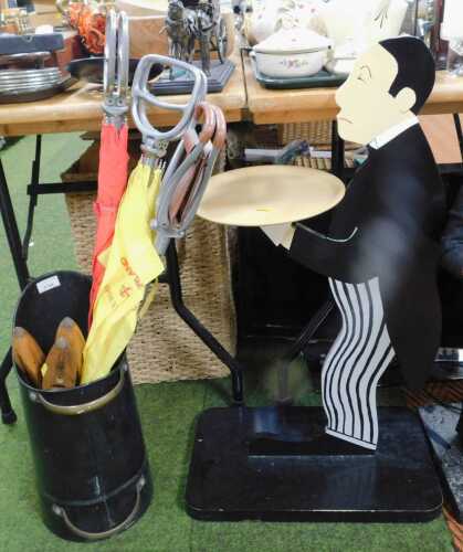 A trio of hunting sticks and umbrellas, together with a coal scuttle, sewing shuttles, and a...