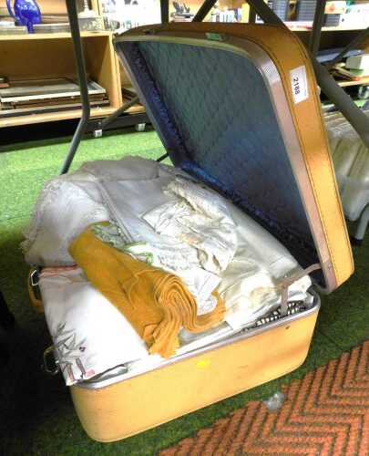 A quantity of linen, to include embroidered linen tablecloths, embroidered handkerchiefs, cotton...