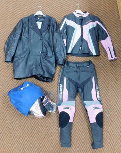 A lady's Agvsport pink and black motorcycling suit (jacket, trousers and gloves), size 10,...