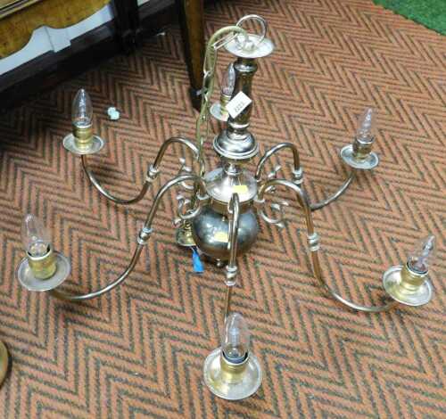A brass effect six branch Dutch style chandelier, 69cm wide.