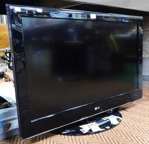 An LG 37" flatscreen television, model 37LH5000, with lead and remote.