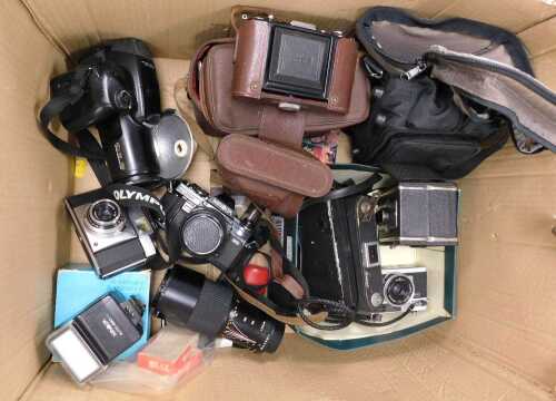 Camera equipment, to include an Olympus IS-3000 digital camera, together with a Minolta camera...