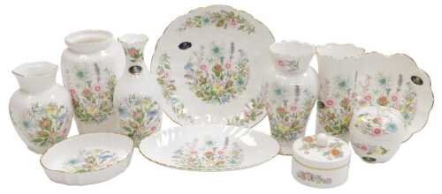 A group of Aynsley porcelain dishes, vases, jars and covers, decorated in the Wild Tudor pattern,...