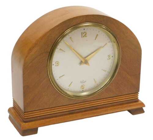 A mid 20thC Elliott mahogany cased mantel clock, circular silvered dial bearing Arabic numerals...