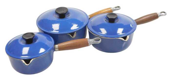Three graduated Le Creuset blue enamel saucepans, with lids, numbers 14, 16, and 18.
