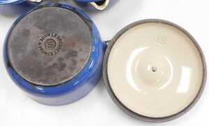 Three graduated Le Creuset blue enamel saucepans, with lids, numbers 14, 16, and 18. - 2