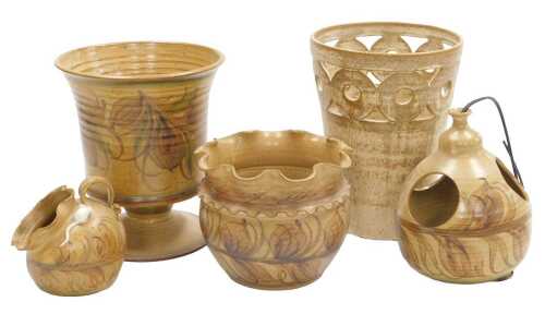 A group of late 20thC Alvingham pottery, comprising a bird feeder, salt pig, two vases, and a...