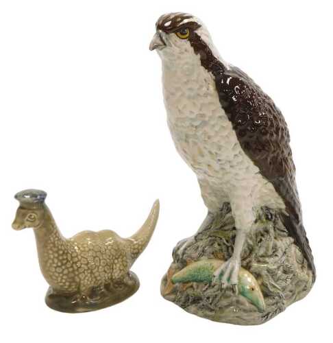 A Beswick Beneagles Osprey whisky decanter, together with a Loch Ness whisky decanter, both with...