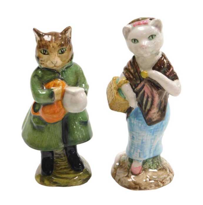 A Beswick Beatrix Potter figure modelled as Susan, and another modelled as Simpkin, brown back...