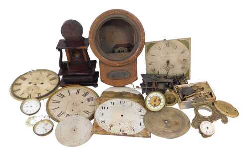 Assorted antique clock parts, including two longcase clock dials, clock movements, cases,...
