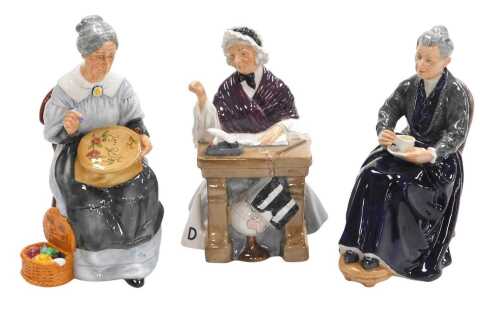 Three Royal Doulton figures, modelled as School Marm HN2223, The Cup of Tea HN2322, and...