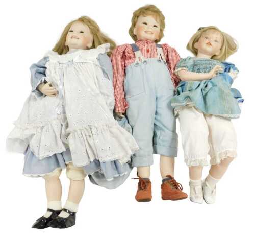 Three porcelain collector's dolls, one named Jennifer, 80cm high.