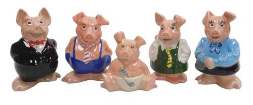 A set of five NatWest piggy banks, comprising Father, Mother, Son, Daughter, and Baby.