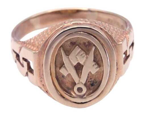 A 9ct gold masonic signet ring, with openwork shoulders, the oval table with set square and...
