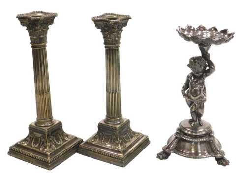 A pair of late 19thC silver plated Corinthian column candlesticks, 27cm high, together with a...