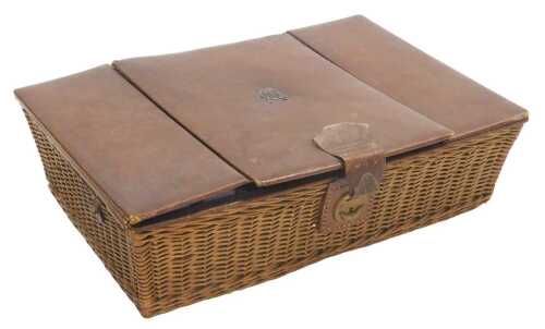 An early 19thC wicker and leather jewellery box, the central lid with a monogram, opening with...
