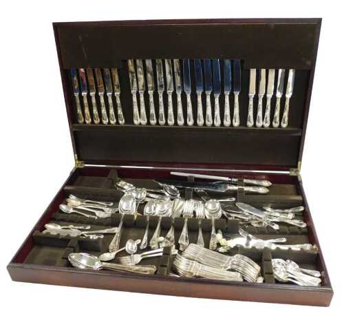 A silver plated canteen of cutlery, in a fancy pattern, twelve place settings, mahogany cased.