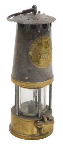 A Protector Lamp & Lighting Co Limited brass and tin oil lamp, type S.L., No. 53, 22.5cm high.